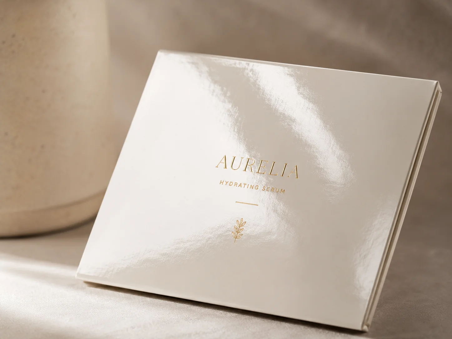 A high gloss laminated carton catching a broad specular highlight across its whole face