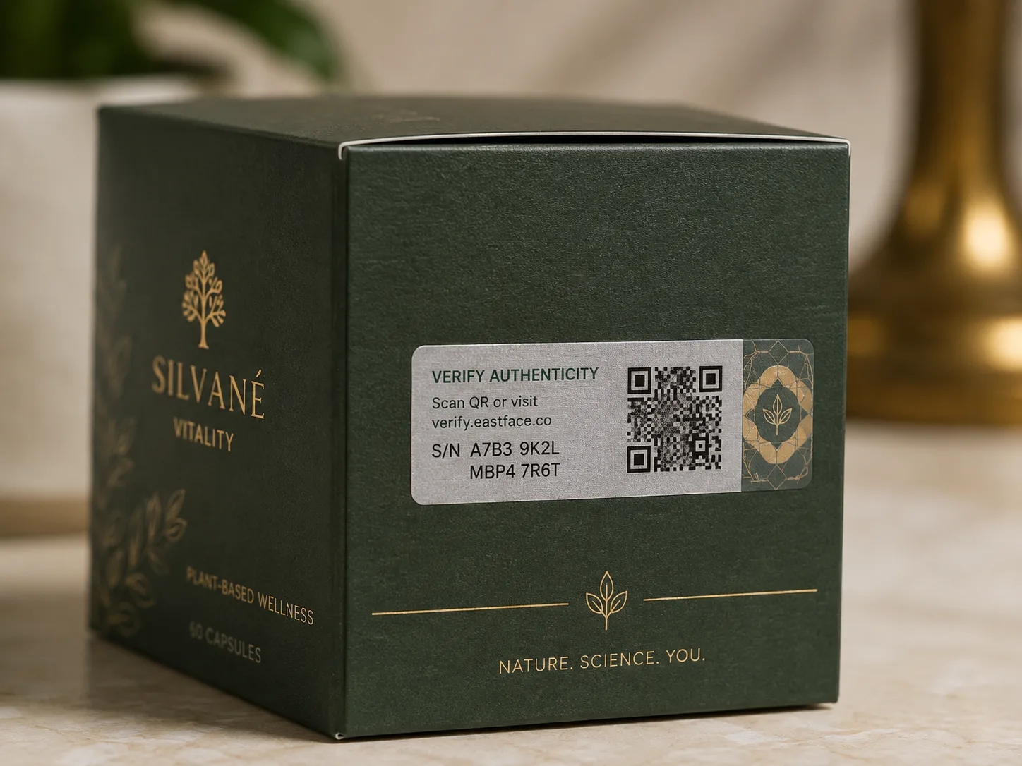A dark green capsule carton with a holographic verification label across the face, carrying a scan code and a serial number